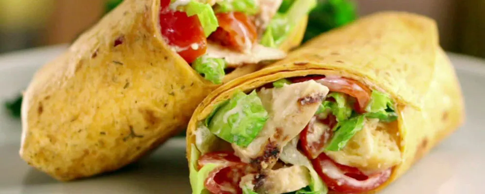 Chicken caesar wrap cut in half